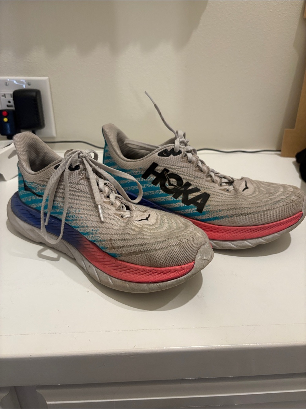 Hoka Gray Running Shoes with Blue and Coral Accents